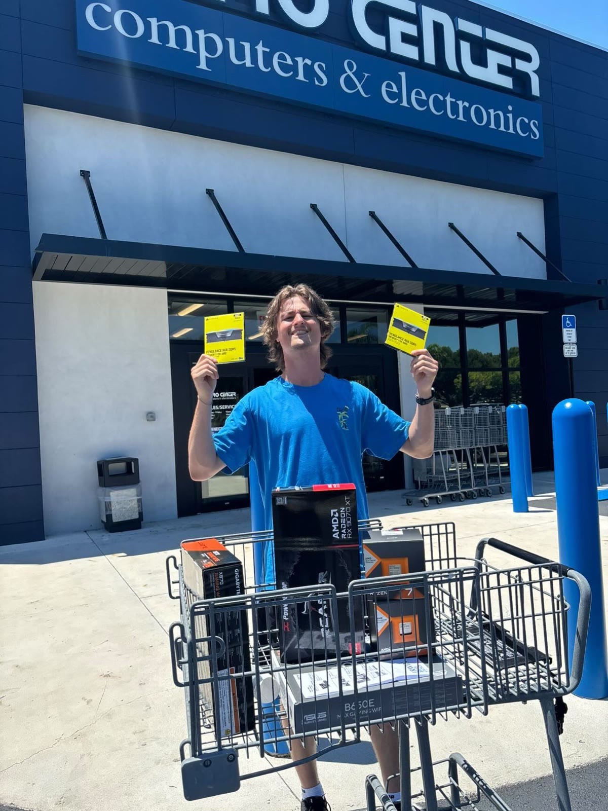 David with a cart full of computer parts outside Micro Center